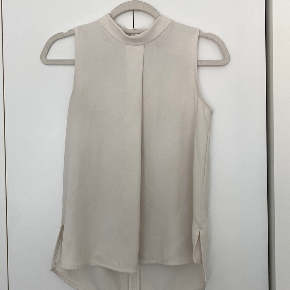 Ann Taylor crème mock neck tank. Work appropriate. Size XS. Mild wear.